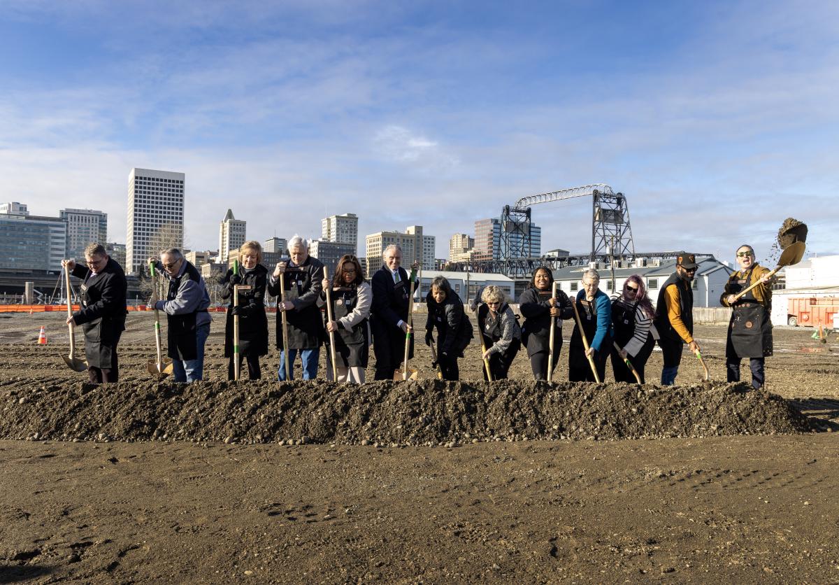 Elected officials and executive directors from the Port of Tacoma and the Tacoma Public schools ceremonially break ground at an event for the Port Maritime Center project Jan. 8, 2025.